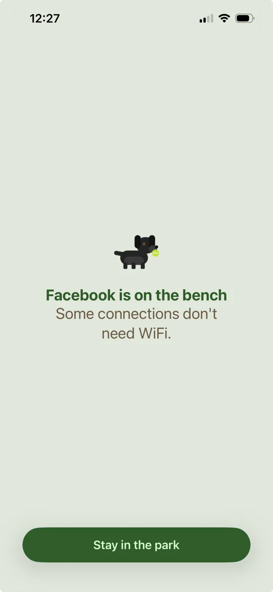 Parkbench block screen for Facebook: a black dog with a tennis ball and “Some connections don't need WiFi.”