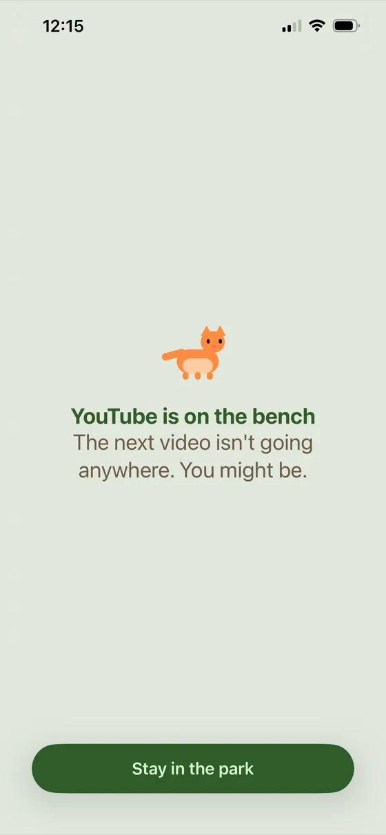 Parkbench block screen for YouTube: a cat with “The next video isn't going anywhere. You might be.”